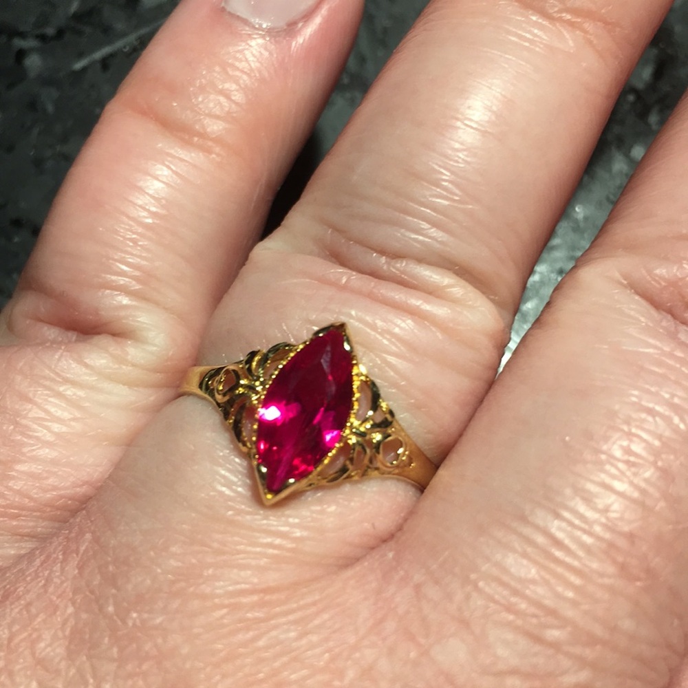 Solid Gold and Red Gemstone Ring
